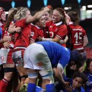 DELIGHT: Wales celebrate Sisilia Tuipulotu's match-winning try against Italy