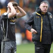 FRUSTRATED: Graham Coughlan with Seb Palmer-Houlden after County's loss at Bradford