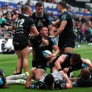 OVERPOWERED: Dewi Lake scored twice for the Ospreys against the Dragons
