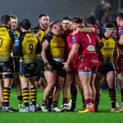 The Dragons after a scrum against the Scarlets in January