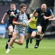 PROMISING: Dragons centre Joe Westwood on the attack at the Ospreys