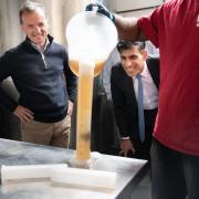 Prime Minister Rishi Sunak meets members of staff at the Vale of Glamorgan Brewery, in Barry, south Wales including MP for Vale of Glamorgan, Alun Cairns (far left) while on the General Election campaign trail.