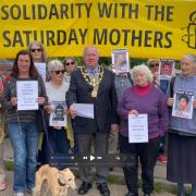 The mayor of Monmouth and Amnesty Monmouthshire held a vigil in solidarity