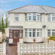The property has an enclosed front garden