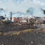 A fundraiser has been set up on behalf of a man who was forced to walk out of his home with the clothes on his back and his dog, when five houses burnt down last week.