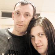 MURDER DENIED: Carl Mills, pictured with fire victim Kayleigh Buckley who died in the blaze at Tillslands, Coed Eva, Cwmbran with her mother, Kim Buckley, 46 and her granddaughter Kimberley, six months