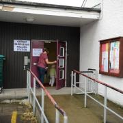 A Polling Station was held at  Caerleon Town Hall for the European Elections.  Pictured is a voter entering the Polling Station. (6458257)