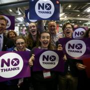 NO supporters celebrate at the Royal Highland Centre, Edinburgh as the final results of the Scottish independence referendum are announced. PRESS ASSOCIATION Photo. Picture date: Friday September 19, 2014. See PA story REFERENDUM Main. Photo credit