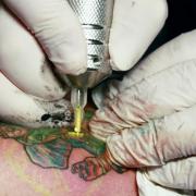 ARTIST: According to a survey 19 per cent of British adults now have a tattoo