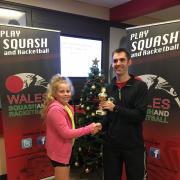 SUCCESS: Newport's Eve Griffiths with coach Greg Tippings and her runner-up trophy from the Welsh Championships