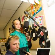 FUN: School DJ's Riley Barton-Williams aged 11 and Katy French aged 11 broadcast to the school on the School Radio