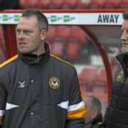 CHALLENGE: January could be a busy month for Newport County manager Michael Flynn, left, and assistant Wayne Hatswell, right