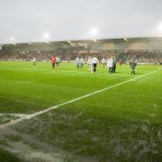 DAMPENER: Saturday's League Two clash with MK Dons was postponed due to a waterlogged pitch at Rodney Parade. Picture: Huw Evans Agency