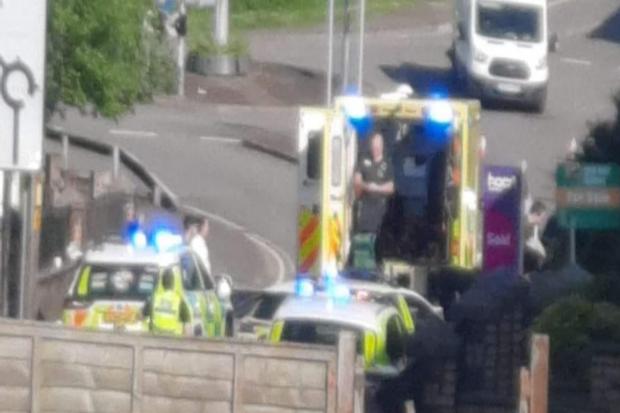 Emergency services at scene of crash as road closed