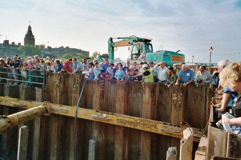 EXCITING FIND: Crowds gather to watch as the remains of Newport's medieval ship are unearthed.