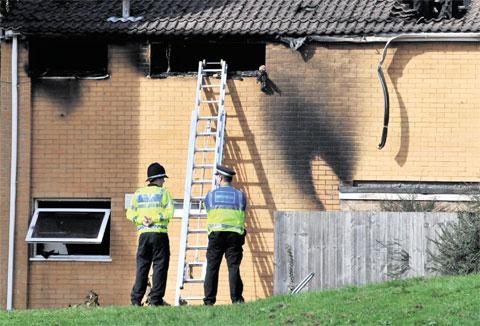 BURNT OUT: The house in Coed Eva where grandmother Kim Buckley, her daughter Kayleigh and her baby Kimberley all died