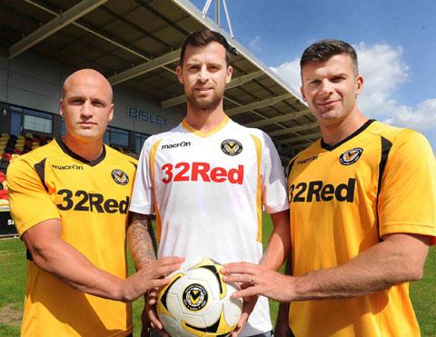 NEW LOOK: Newport County’s new kit for their return to the Football League modelled by, from left, David Pipe, Byron Anthony and Tony James