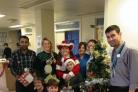 GIVING: Charlie Zennadi - centre- with staff and patients at the hospital. (3147798)