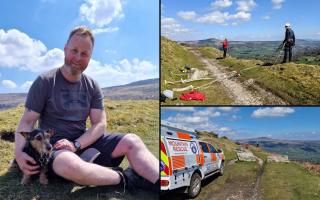 Michael Foster, with dog Salty after Longtown Mountain Rescue Team members rescued him. Pictures: Longtown MRT