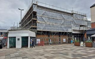 Scaffolding has covered the former House of Fraser store in Cwmbran.