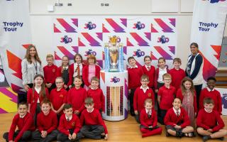 Year 4 pupils at Caerleon Lodge Hill Primary School in Newport with the Premier League trophy. Picture: Matt Horwood