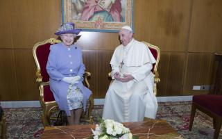 The late Queen Elizabeth II with Pope Francis.