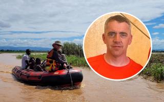 Firefighter Darren Cleaves (inset), from Monmouth, is helping rescue flood victims in Malawi.