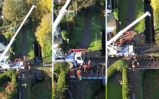 Drone captures new bridge being put into place at Fourteen Locks