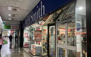 Forensics officers scrub high street book shop for clues after break-in