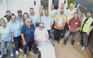 A building charity unveils a completed bedroom project, taking a Newport man who suffered a stroke on a tour of the renovation.