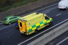 An ambulance negoiates traffic on the M4 (13180515)