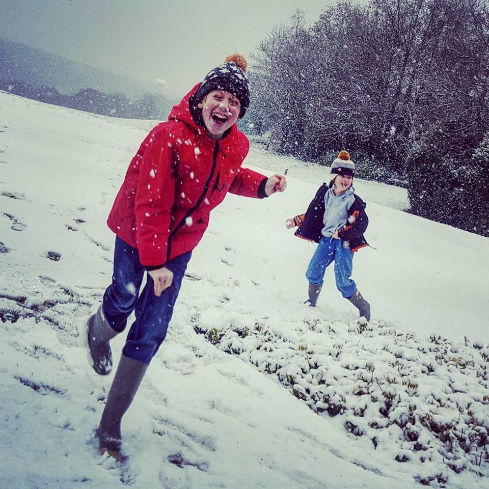 Elizabeth Turner's sons enjoying a snowball fight at Caerleon