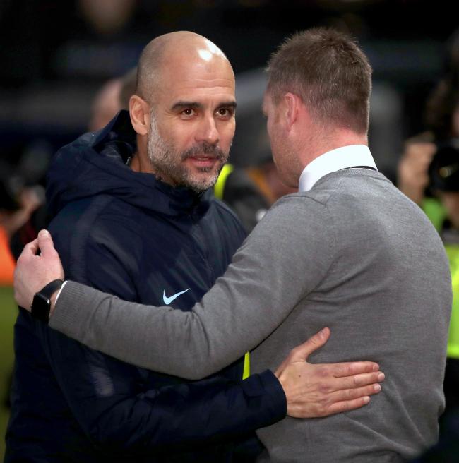 RESPECT: Manchester City manager Pep Guardiola, left, and Newport County boss Michael Flynn