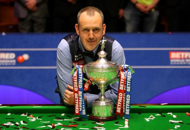 South Wales Argus: Mark Williams with the trophy after winning the 2018 Betfred World Championship at The Crucible, Sheffield. Picture: Richard Sellers/PA Wire