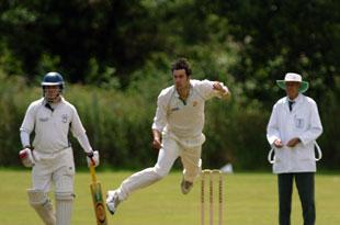 Chepstow bowler Glenn Eglinton fires one in against the Malpas batsman