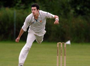 Chepstow bowler Glenn Eglinton steps up the bowling attack against Malpas